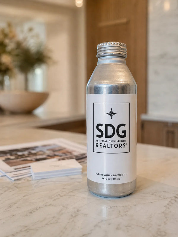 Realtors custom-labeled aluminum bottled water at a luxury open house use case